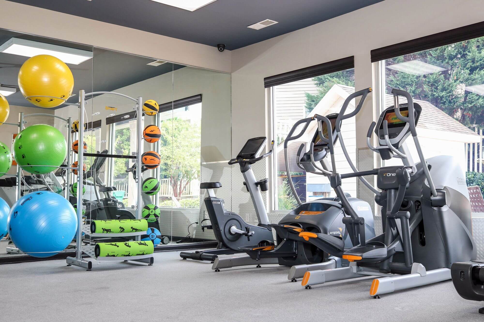 campus edge raleigh off campus apartments near nc state university resident clubhouse fitness center cardio machines medicine balls equipment